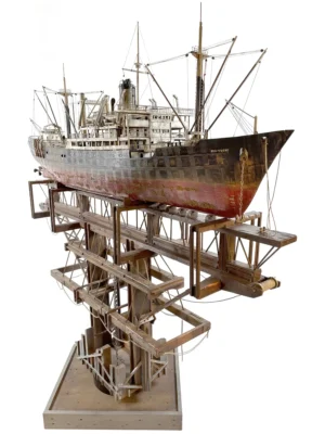 Artistic sculpture of the 'GHOST' cargo ship, crafted with intricate details to represent the industrial strength and mystique of a cargo vessel in a folk art style.
