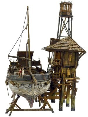 Artistic sculpture of a fishing boat with two figures, a boy and a girl, symbolizing love and companionship on the water, intricately crafted in folk art style.